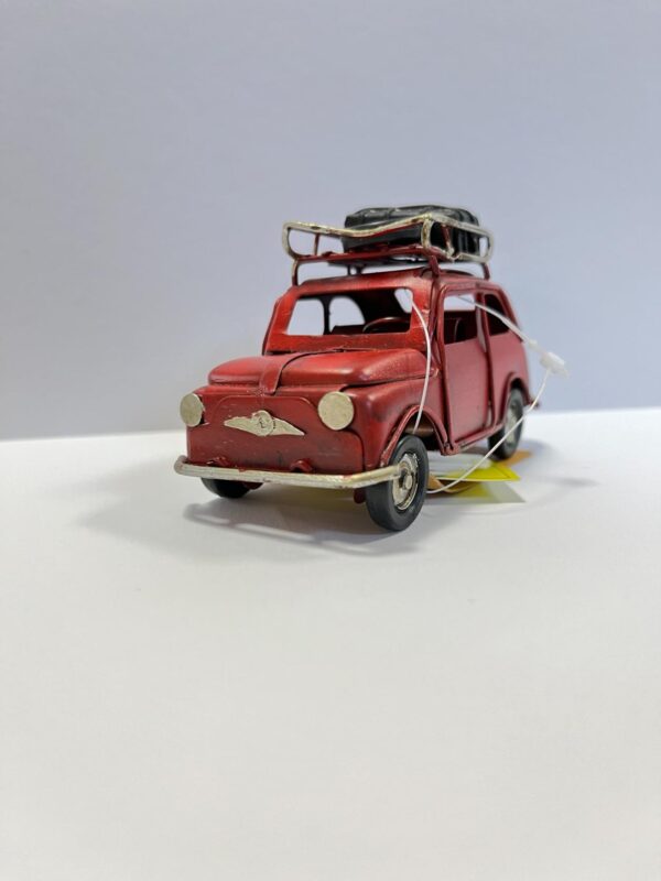 Fiat 500 rood met dakrek